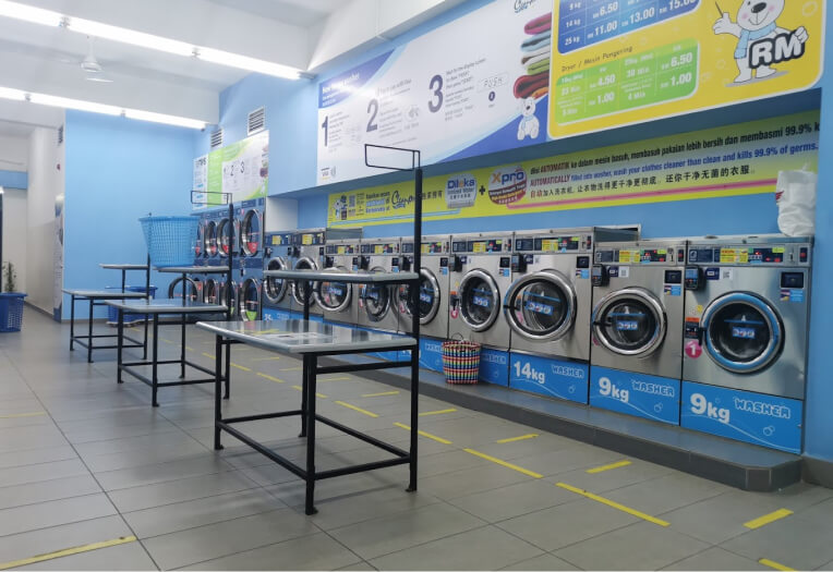 Cleanpro Express Taman Putra Impiana laundry folding table and washing machine